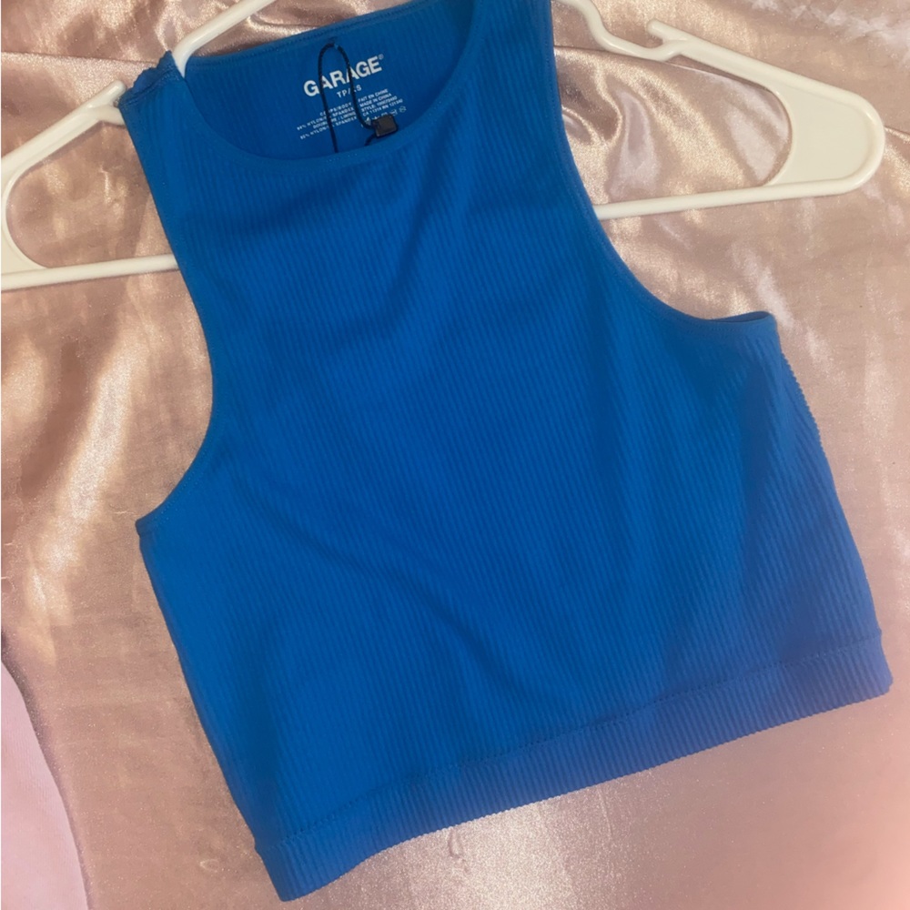 Garage top brand new and never been worn.